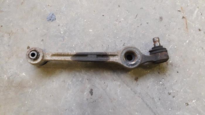 Front lower wishbone, left from a Mazda Demio (DW) 1.3 16V 1998
