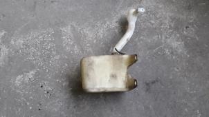 Used Front windscreen washer reservoir Mazda Demio (DW) 1.3 16V Price on request offered by Autodemontage Joko B.V.