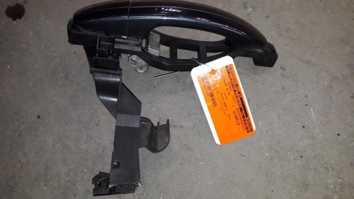 Rear door handle 4-door, right from a Ford S-Max (GBW) 1.8 TDCi 16V 2008