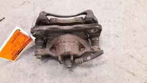 Used Front brake calliper, left Honda Logo (GA33) 1.3 Price on request offered by Autodemontage Joko B.V.