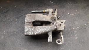 Used Rear brake calliper, left Opel Meriva 1.3 CDTI 16V Price on request offered by Autodemontage Joko B.V.
