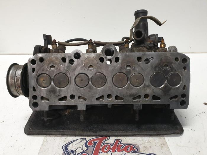 Cylinder head Volkswagen Transporter T3 1.6 TD Syncro 068103373D JX Cylinder head Volkswagen Transporter T3 1.6 TD Syncro 068103373D JX