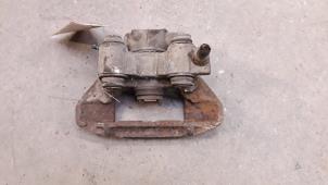 Used Rear brake calliper, right Renault Clio Price on request offered by Autodemontage Joko B.V.