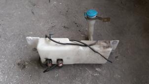 Used Front windscreen washer reservoir Ssang Yong Rexton 2.9 TD RJ 290 Price on request offered by Autodemontage Joko B.V.