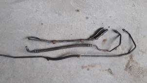 Used Power steering line Ssang Yong Rexton 2.9 TD RJ 290 Price on request offered by Autodemontage Joko B.V.