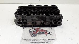 Used Cylinder head Citroen Berlingo 1.6 Hdi 16V 90 Price on request offered by Autodemontage Joko B.V.