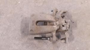 Used Rear brake calliper, left Opel Zafira (M75) 1.7 CDTi 16V Price on request offered by Autodemontage Joko B.V.