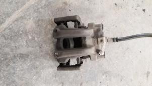 Used Rear brake calliper, left BMW 3 serie Touring (F31) 318d 2.0 16V Price on request offered by Autodemontage Joko B.V.