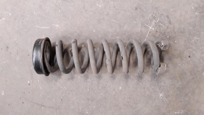 Rear coil spring from a BMW 3 serie Touring (F31) 318d 2.0 16V 2013