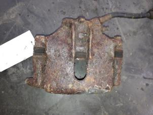 Used Front brake calliper, left Renault Megane Scénic (JA) 2.0 RT Price on request offered by Autodemontage Joko B.V.