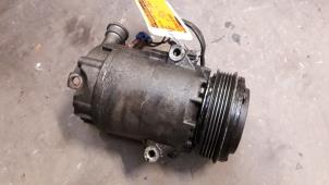 Used Air conditioning pump Opel Corsa C (F08/68) 1.2 16V Price on request offered by Autodemontage Joko B.V.