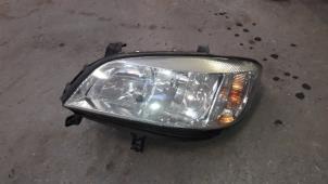 Used Headlight, left Opel Zafira (F75) 1.8 16V Price on request offered by Autodemontage Joko B.V.