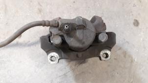 Used Front brake calliper, left Ford Galaxy (WA6) 2.0 TDCi 16V 140 Price on request offered by Autodemontage Joko B.V.