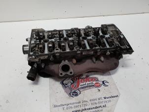 Used Cylinder head Opel Zafira Tourer (P12) 2.0 CDTI 16V 165 Ecotec Price on request offered by Autodemontage Joko B.V.