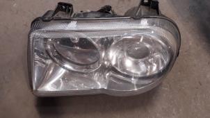 Used Headlight, left Chrysler 300 C 3.0 CRD V6 24V Price on request offered by Autodemontage Joko B.V.