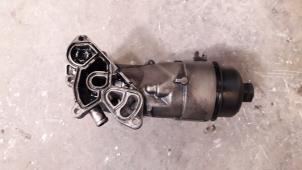 Used Oil filter housing Peugeot 307 SW (3H) 1.6 HDi 16V Price on request offered by Autodemontage Joko B.V.