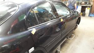Used Rear door 4-door, right Mitsubishi Carisma 1.9 DI-D MP Price on request offered by Autodemontage Joko B.V.