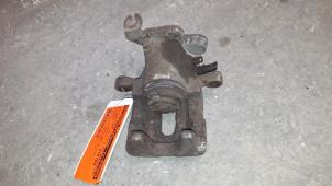 Used Rear brake calliper, left Mitsubishi Carisma 1.9 DI-D MP Price on request offered by Autodemontage Joko B.V.