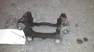 Used Rear brake calliperholder, left Opel Meriva 1.4 16V Ecotec Price on request offered by Autodemontage Joko B.V.