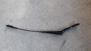 Used Front wiper arm Opel Corsa E 1.2 16V Price on request offered by Autodemontage Joko B.V.