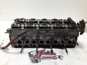 Used Cylinder head Peugeot 607 (9D/U) 2.2 HDi 16V FAP Price on request offered by Autodemontage Joko B.V.