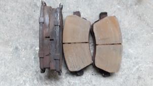 Used Front brake pad Nissan Micra (K12) 1.2 16V Price on request offered by Autodemontage Joko B.V.