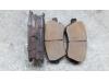 Front brake pad from a Nissan Micra (K12), 2003 / 2010 1.2 16V, Hatchback, Petrol, 1.240cc, 59kW (80pk), FWD, CR12DE, 2003-01 / 2010-06, K12BB02; K12FF02; K12FF03 2006