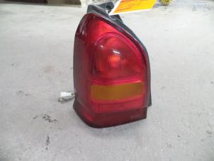 Used Taillight, left Suzuki Alto (RF410) 1.1 16V Price on request offered by Autodemontage Joko B.V.