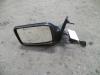 Wing mirror, left from a Volkswagen Golf 1995