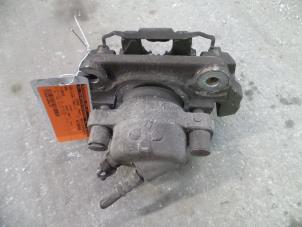 Used Front brake calliper, left BMW 3 serie Touring (E91) 318d 16V Price on request offered by Autodemontage Joko B.V.