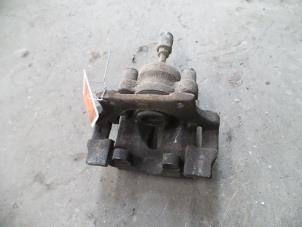 Used Rear brake calliper, left BMW 3 serie Touring (E91) 318d 16V Price on request offered by Autodemontage Joko B.V.