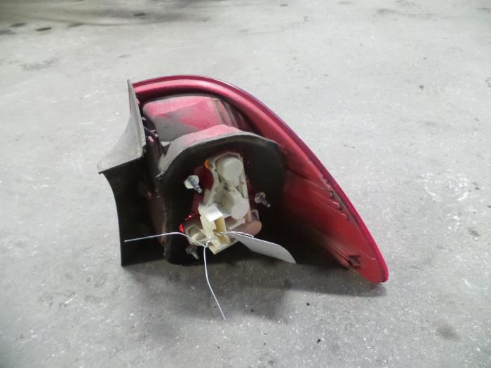 Taillight, left from a BMW 3 serie Touring (E91) 318d 16V 2007