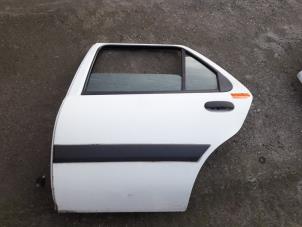 Used Rear door 4-door, left Ford Fiesta 4 1.3i Price on request offered by Autodemontage Joko B.V.
