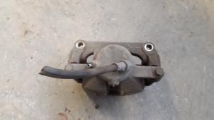 Used Front brake calliper, right Renault Kangoo Express (FW) 1.5 dCi 75 Price on request offered by Autodemontage Joko B.V.