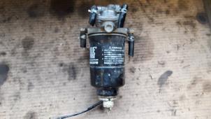Used Fuel filter housing Nissan King Cab/Pickup 4x4 (D22) 2.5 Tdi Price on request offered by Autodemontage Joko B.V.