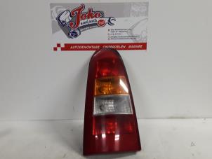 Used Taillight, left Opel Astra G Caravan (F35) 1.6 16V Price on request offered by Autodemontage Joko B.V.