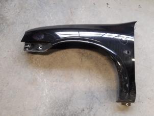Used Front wing, left Opel Corsa B (73/78/79) 1.4i Price on request offered by Autodemontage Joko B.V.
