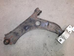 Used Front lower wishbone, left Volkswagen Caddy Price on request offered by Autodemontage Joko B.V.