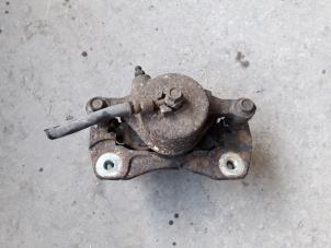 Used Front brake calliper, left Chevrolet Tacuma 1.6 16V Price on request offered by Autodemontage Joko B.V.