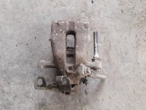 Used Rear brake calliper, left Opel Meriva 1.4 16V Ecotec Price on request offered by Autodemontage Joko B.V.