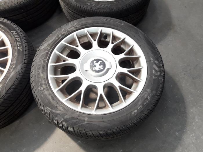 Set of sports wheels from a Peugeot 206 (2A/C/H/J/S) 1.6 XS,XT 2000
