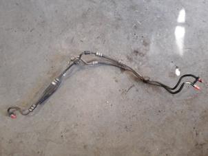 Used Power steering line Citroen C4 Picasso (UD/UE/UF) 1.6 HDiF 16V 110 Price on request offered by Autodemontage Joko B.V.