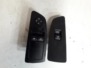Used Electric window switch BMW 1 serie (E87/87N) 118d 16V Price on request offered by Autodemontage Joko B.V.