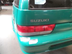 Used Taillight, left Suzuki Swift (SF310/413) 1.3i 16V Price on request offered by Autodemontage Joko B.V.