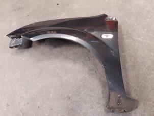 Used Front wing, left Ford Fiesta 5 (JD/JH) 2.0 16V ST150 Price on request offered by Autodemontage Joko B.V.