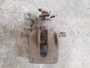 Used Rear brake calliper, left Ford Fiesta 5 (JD/JH) 2.0 16V ST150 Price on request offered by Autodemontage Joko B.V.