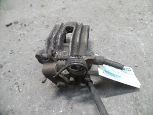 Used Rear brake calliper, right Volkswagen Passat Variant Syncro/4Motion (3B5) 1.9 TDI 110 Syncro Price on request offered by Autodemontage Joko B.V.
