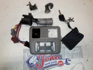 Used Ignition lock + key Peugeot 306 Break (7E) 1.9 DT Price on request offered by Autodemontage Joko B.V.