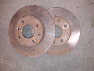 Used Front brake disc Renault Clio II (BB/CB) 1.4 16V Si Price on request offered by Autodemontage Joko B.V.