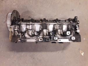 Used Cylinder head Renault Laguna II Grandtour (KG) 1.9 dCi 110 Price on request offered by Autodemontage Joko B.V.